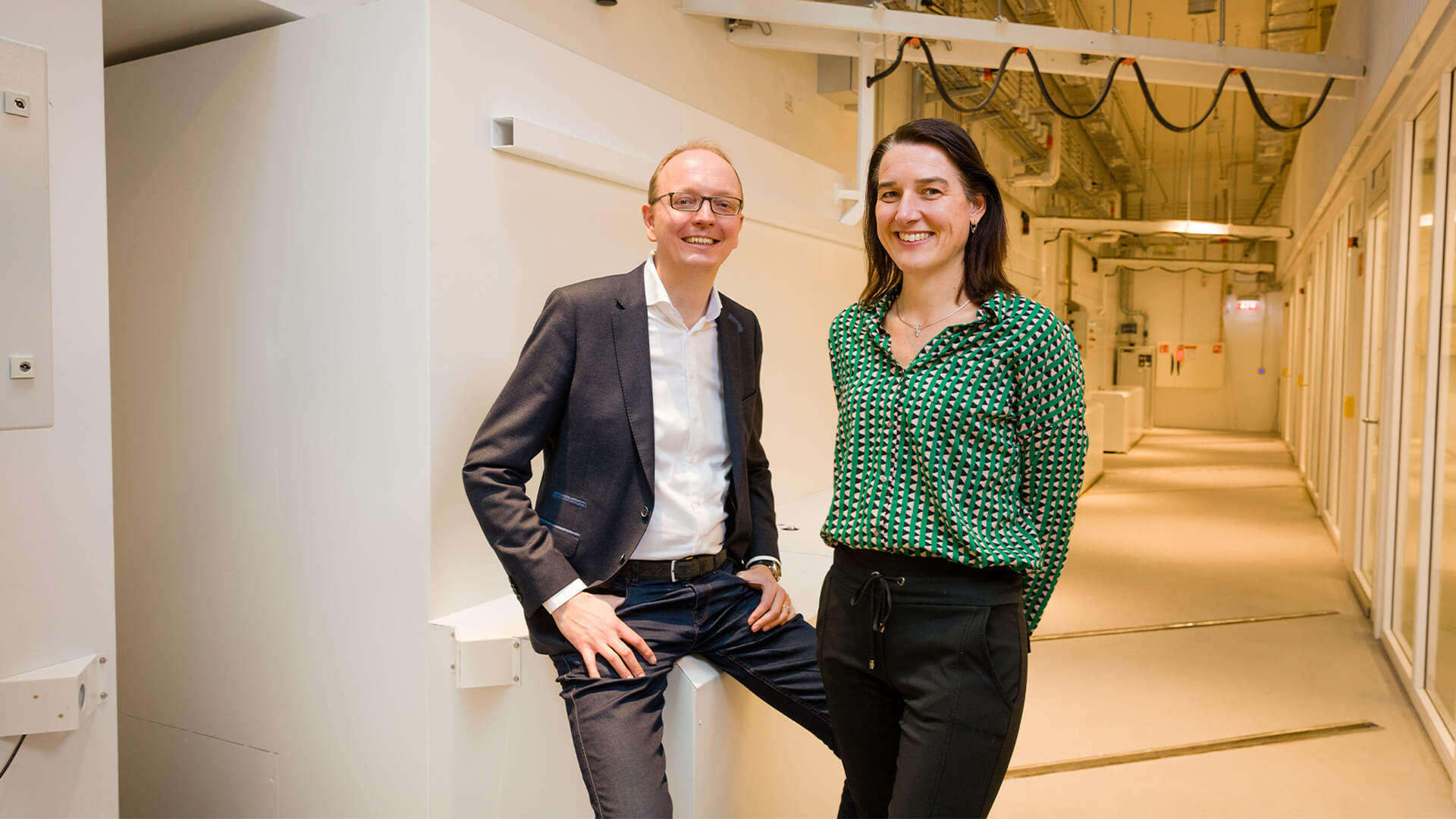 Maria Vosjan of BV Cyclotron VU and Von Gahlen’s Alex Duiker in front of the massive bunker doors, built by Von Gahlen.